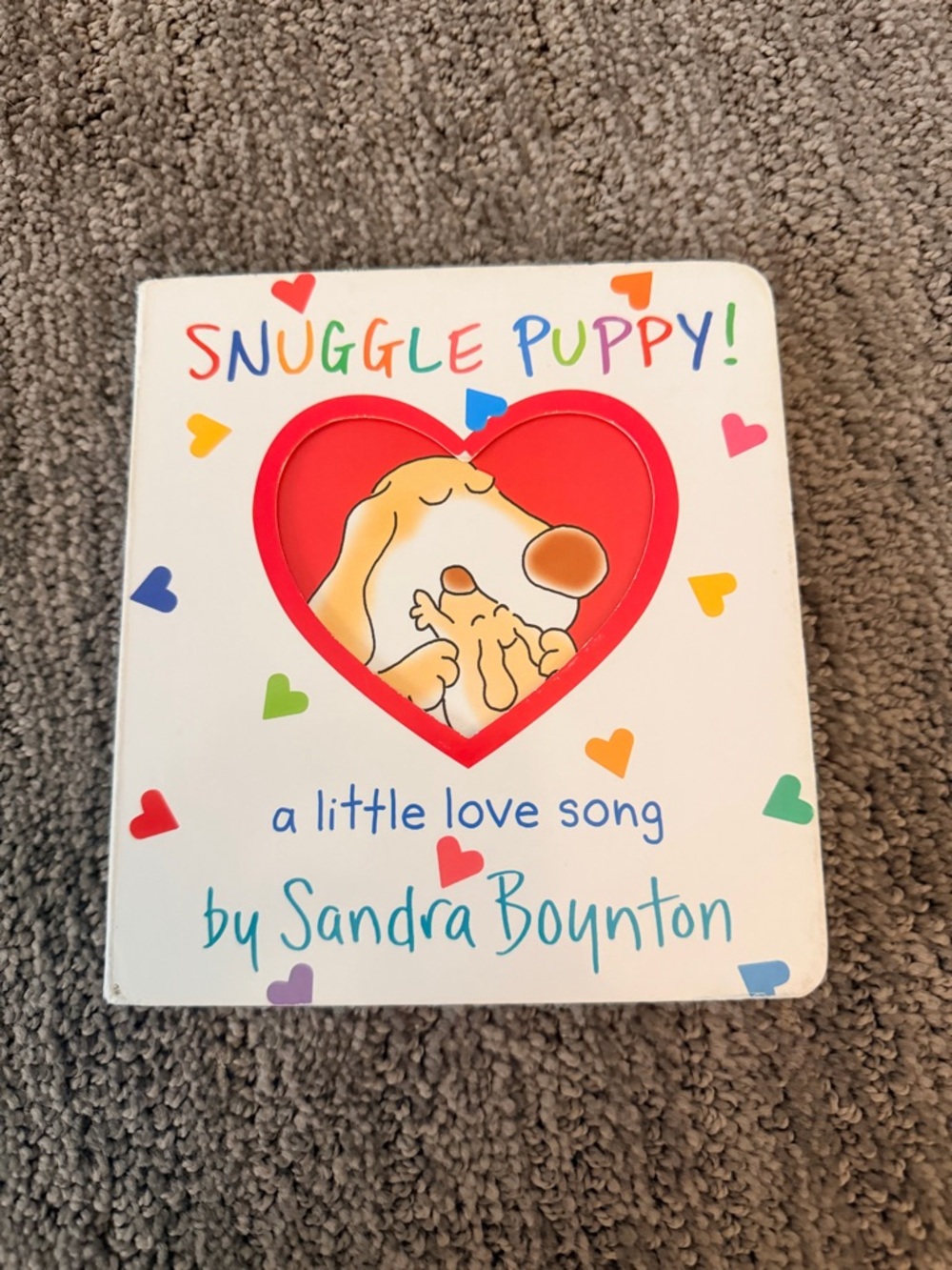 Snuggle Puppy! A Little Love Song" by Sandra Boynton. Children’s board book